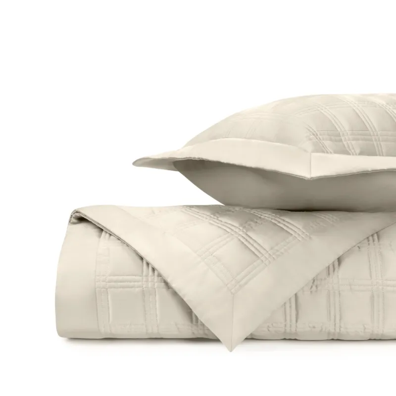 Home Treasures Block quilted coverlet and euro sham set in ivory with geometric stitching.