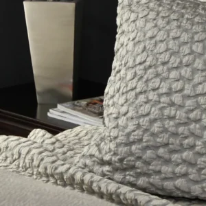 SDH Petalo firm decorative pillow in silver-grey with textured bubble weave pattern.