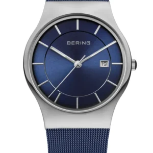 Bering Herrenuhr mit blauem Zifferblatt, silbernem Gehäuse und blauem Milanaise-Armband